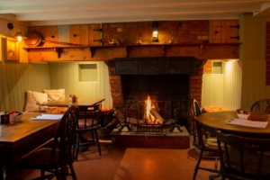 Open fireplace in the bar at The Gate Pub