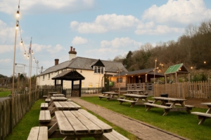 Beer garden with picnic benches at The Gate Pub